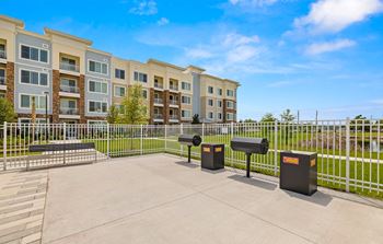 The preserve at ballantyne commons apartments courtyard with trash cans